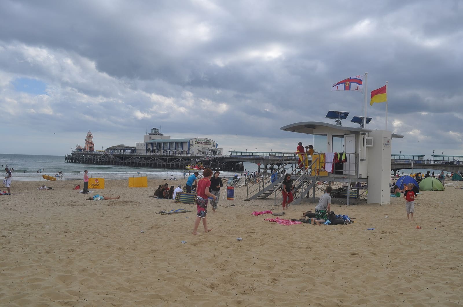 Bournemouth beach busy with families on a sunny day
